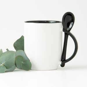 Mug with colored interior and spoon